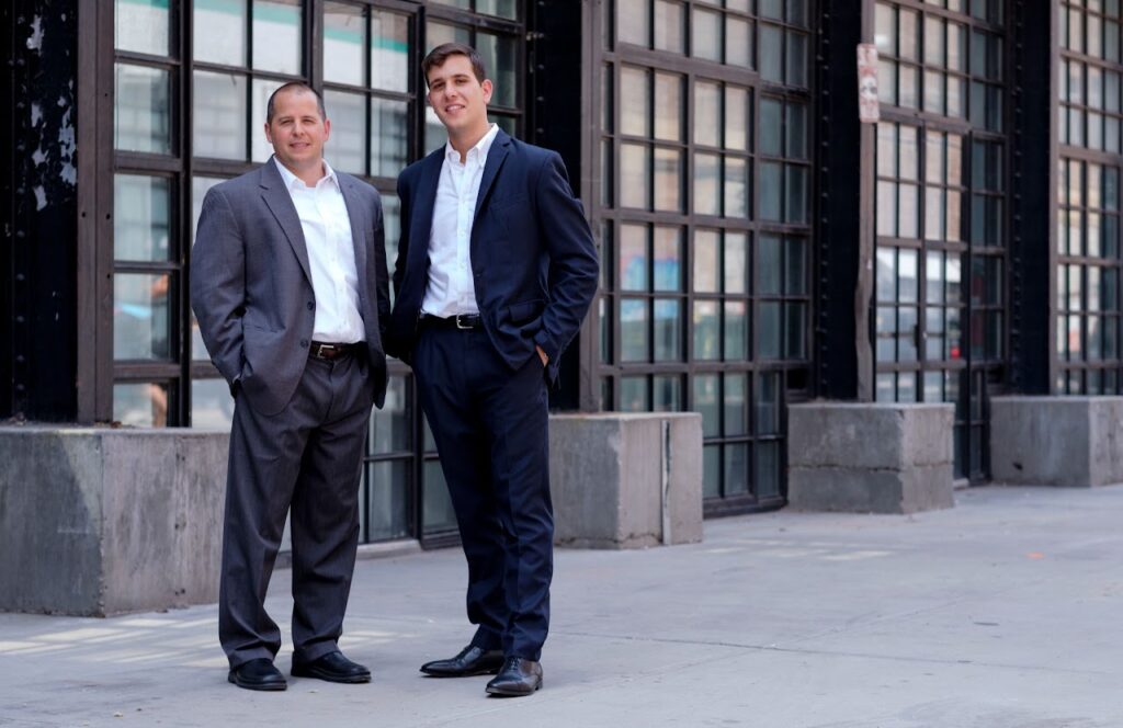 Image of the Invictus Property Advisors team member Josh and Andrew in photo, with the text 'Specialized in Investment Sales - Commercial Real Estate Brokerage experts - Handling Transactions from $1-$100 Million - Swift and Seamless Execution - Years of Industry Knowledge and Experience.